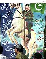 Mush_horse_ass_1966002_mural150_ap  This is a poster from the "Referendum" campaign of Pakistani "Chief Executive" aka dictator Pervez Musharraf. Such was his popularity that he won 150% of the votes cast in Gujranwala, his home constituency. 